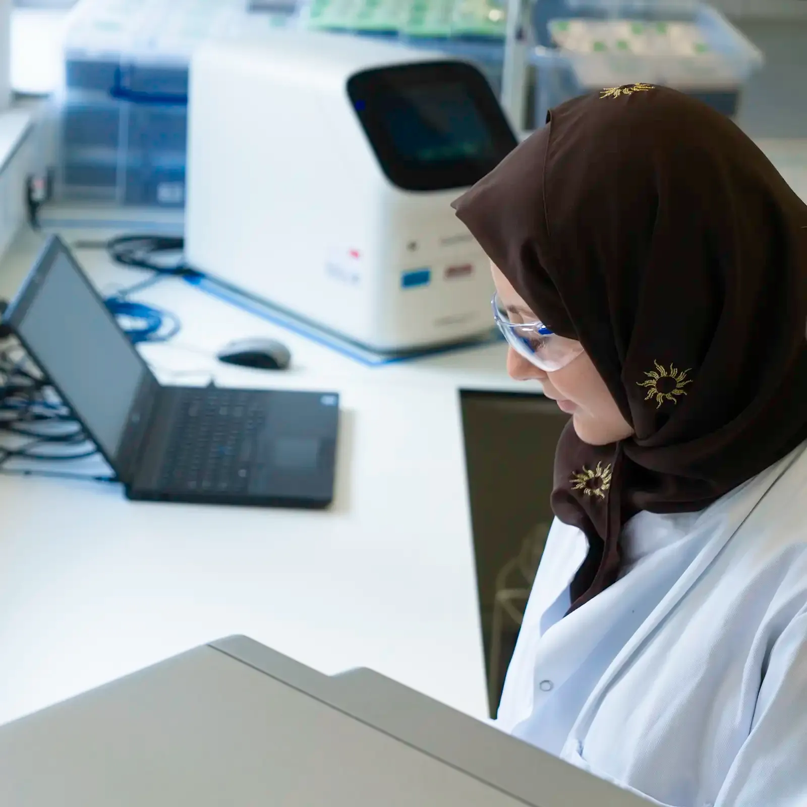 Laboratory scientist reviewing test results