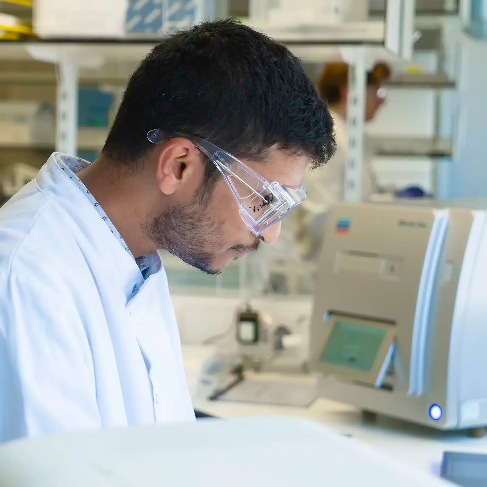 Laboratory scientist reviewing test results